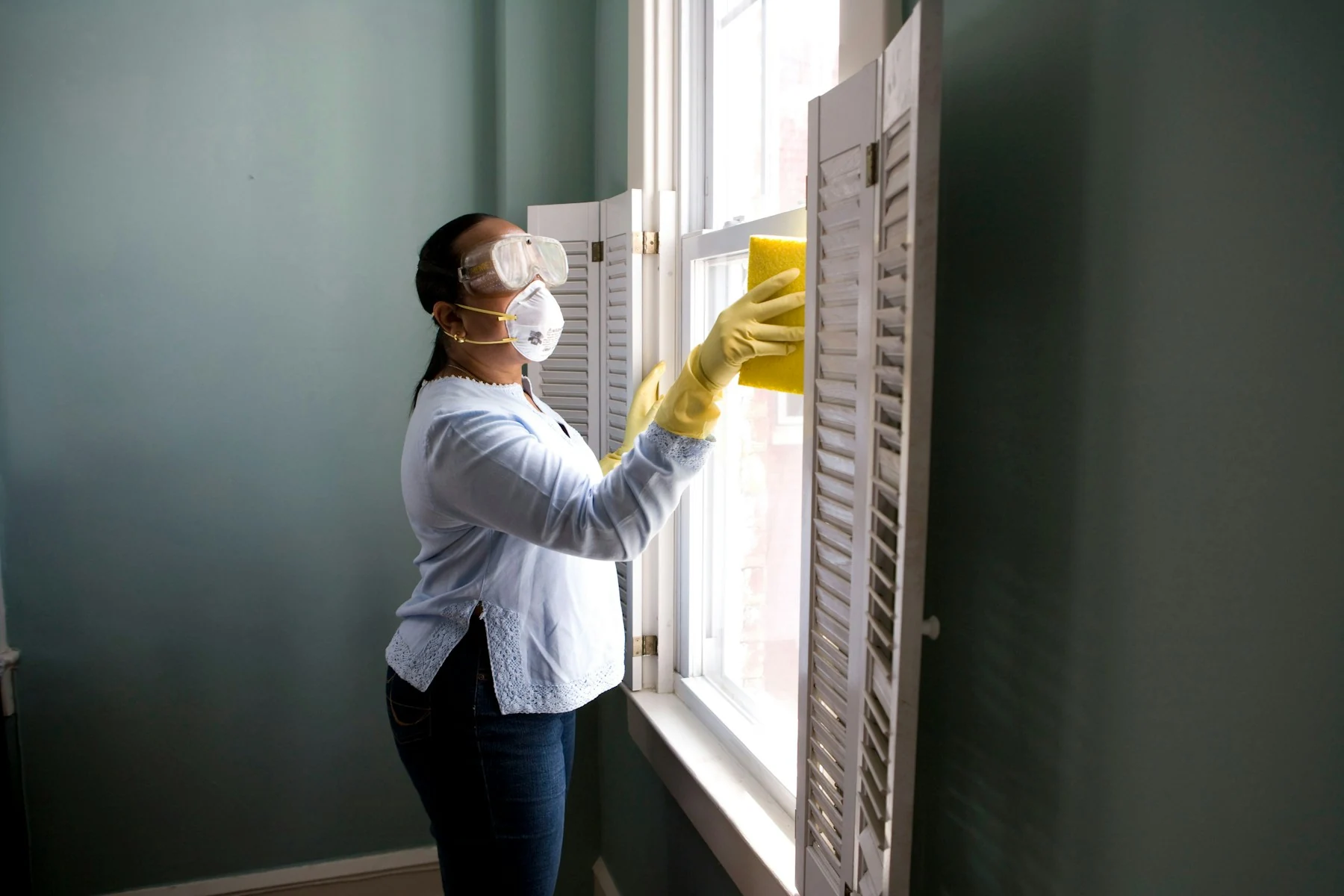 A person carrying out household cleaning
